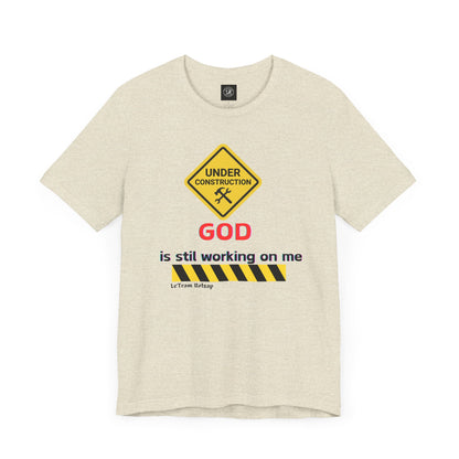 God is still working on me Short Sleeve Tee